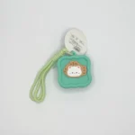 کیف هندزفری مدل سیلیکونی سبز به همراه بند فانتزی سبز